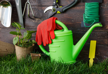 Gardening tools and equipment closeup in the backyard.