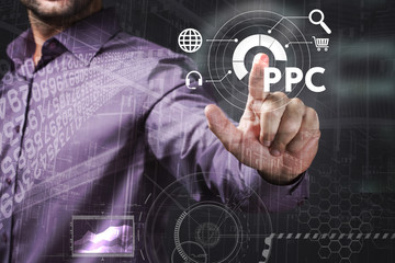Business, Technology, Internet and network concept. Young businessman working on a virtual screen of the future and sees the inscription: PPC