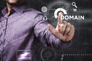 Business, Technology, Internet and network concept. Young businessman working on a virtual screen of the future and sees the inscription: Domain