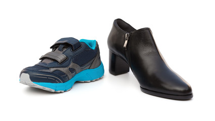 black shoes for son and mom on white as filiation concept