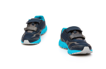 pair of blue and black sporty shoes for kid on white background