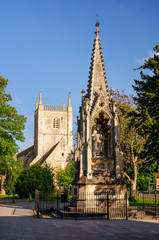 Fototapeta na wymiar St Mary's Square with monument and church in Gloucester, England