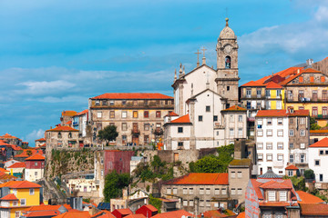 Obraz premium Aerial view with traditional multicolored quaint houses in Old town of Porto in the sunny day, Portugal