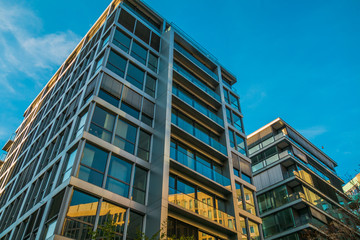 modern glass facade of finance buildings