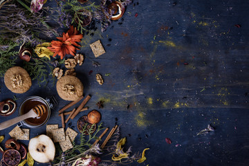 Dessert pastries with oriental spices on wooden background. Free space.