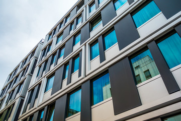 modern office facade with blue colored windows