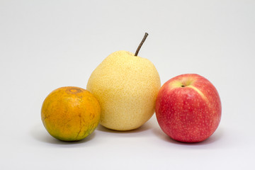 Isolated fruit picture. Honey Orange, Chinese pear and Apple