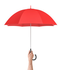 A white male hand vertically holding an open red umbrella on white background. © gearstd