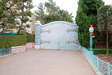 How about: A picturesque view featuring the entrances to a castle, park, and house, surrounded by...
