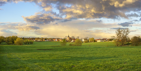 Fototapeta premium Storm clouds in the evening over the village, Brandenburg, Germany