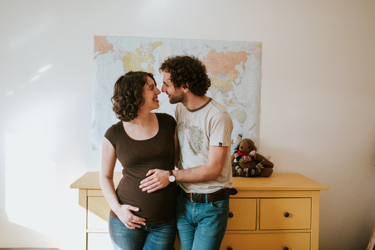 pregnant couple at home