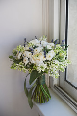 The light delicate bouquet . in green and white.Ranunculus Buttercup