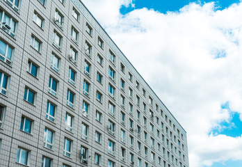 typical Berlin plattenbau building with clouds in the background
