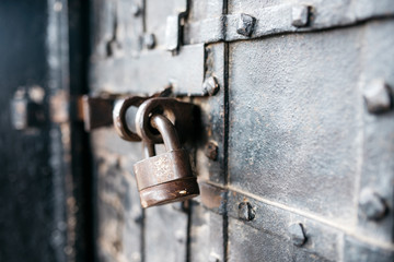 Old lock on the iron door, cropped image