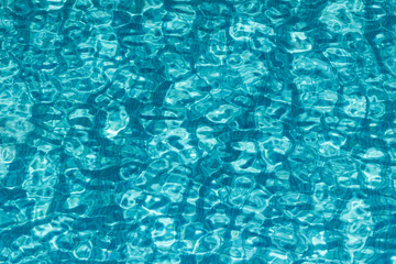 Surface of the water in the pool. Texture of the water