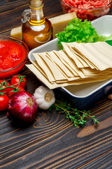 dried uncooked lasagna pasta sheets and ingridients