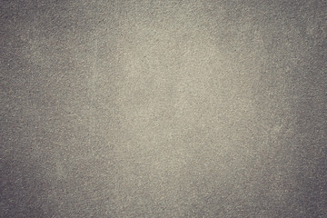 concrete wall made from sand and mix cement, concrete wall background. vintage photo and film style.