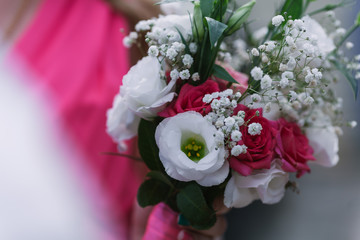 Beautiful modern wedding bouquet with pink lace