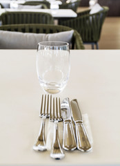 fork and knife on  a restaurant table