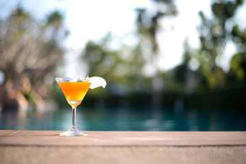 Tasty cocktail background swimming pool