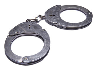 German police handcuffs isolated on white background.