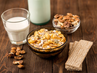 Oat flakes with milk and nuts. Fitness breakfast.  Healthy eating, dieting, slimming and weigh loss concept.