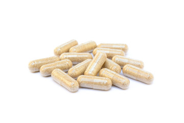 Natural medicine capsules isolated on a white background