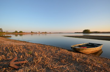 Sunset over a quiet lake in Northern France