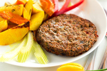 Tasty beef cutlet with potato and bell pepper