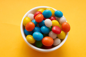 candy colored balls in a bowl
