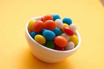 candy colored balls in a bowl