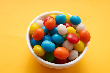 candy colored balls in a bowl