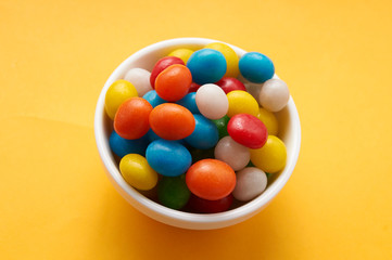 candy colored balls in a bowl