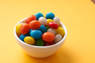 candy colored balls in a bowl