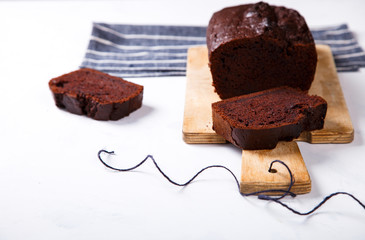 Cake ,Cupcake with Bananas and Chocolate.Homemade Cakes on a light Background.Copy space for Text. selective focus.