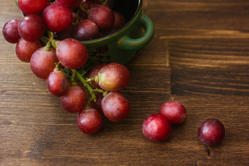 Grapes on wooden background