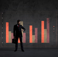 Businessman with briefcase standing over column diagram background. Business, office, career, job concept.