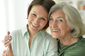 Beautiful elderly mother with an adult daughter