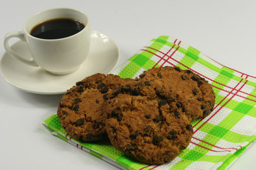 Coffee cup with oatmeal cookie chocolate on white background