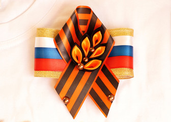 Festive brooch with a St.George's Ribbon