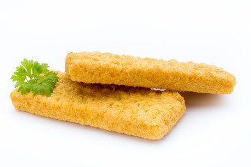 Fish fingers on the white background.