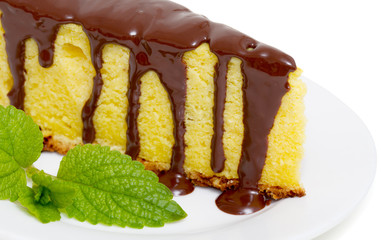 piece of cheesecake with chocolate glaze, isolated on white