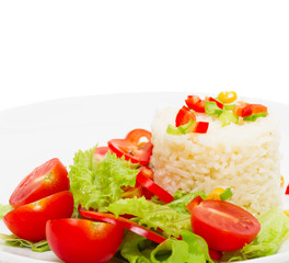rice with fresh vegetable salad, close-up