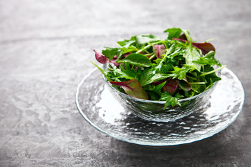 Fresh Green Mix Salad .Leaves Of Spinach,Arugula,Romaine,Lettuce.Concept of Healthy Food.Copy space for Text.Vegetarian. selective focus.