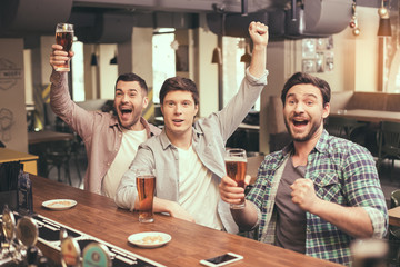 Friends having fun in pub