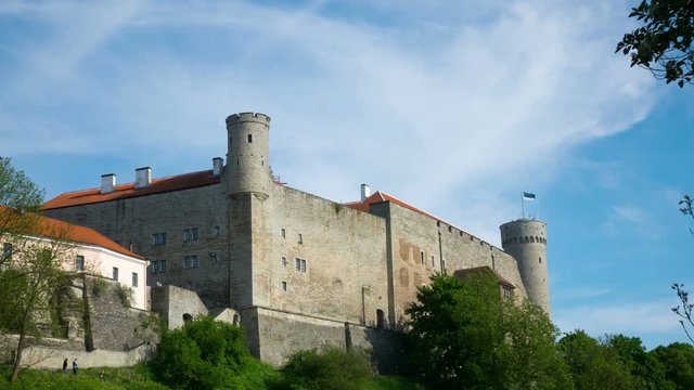 clouds in the blue sky move over Long Herman - a tower of Toompea Castle on the hill Toompea. Tallinn, Estonia ,Time lapse.
