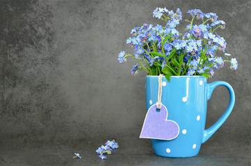 Fathers Day and Mothers Day flowers on dark grunge background