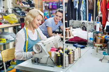 Female tailors working in sewing workshop