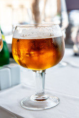 Misted glass with a light beer.