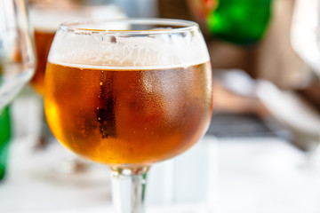 Misted glass with a light beer.